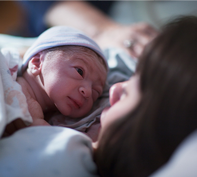 Woman holding a baby